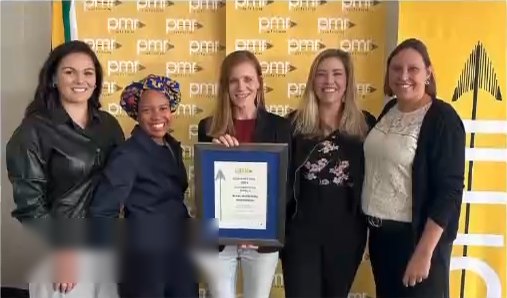 Bentel Associates team members receiving an award certificate